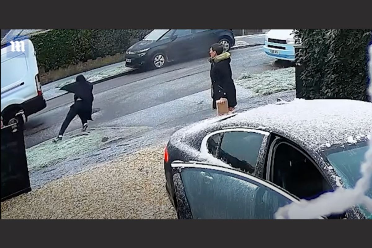 Delivery driver fail slips on ice