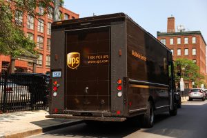 UPS delivery truck parked in New York while driver is making delivery.