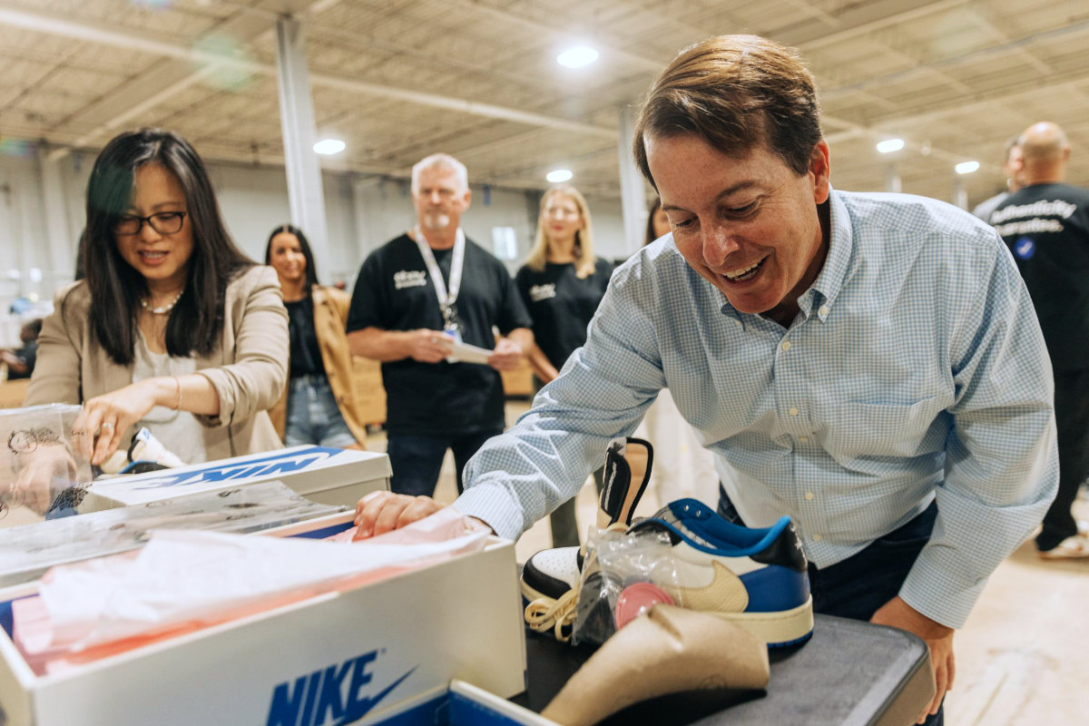 eBay CEO Jamie Iannone visiting New Jersey authentication center.